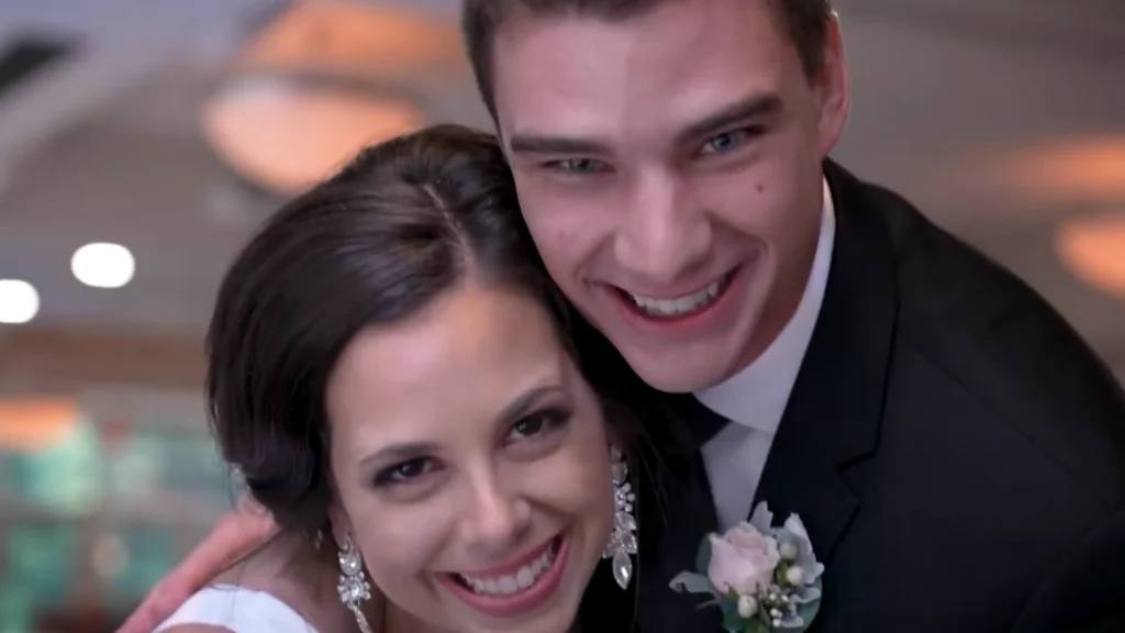 Bride and groom smiling together during their wedding reception celebration